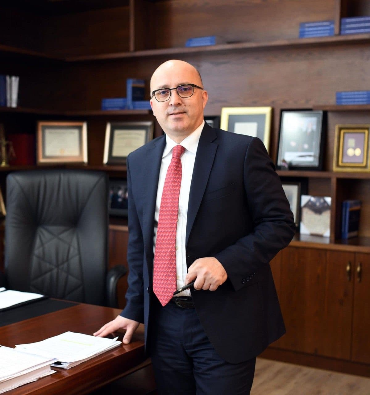 Attorney standing in office